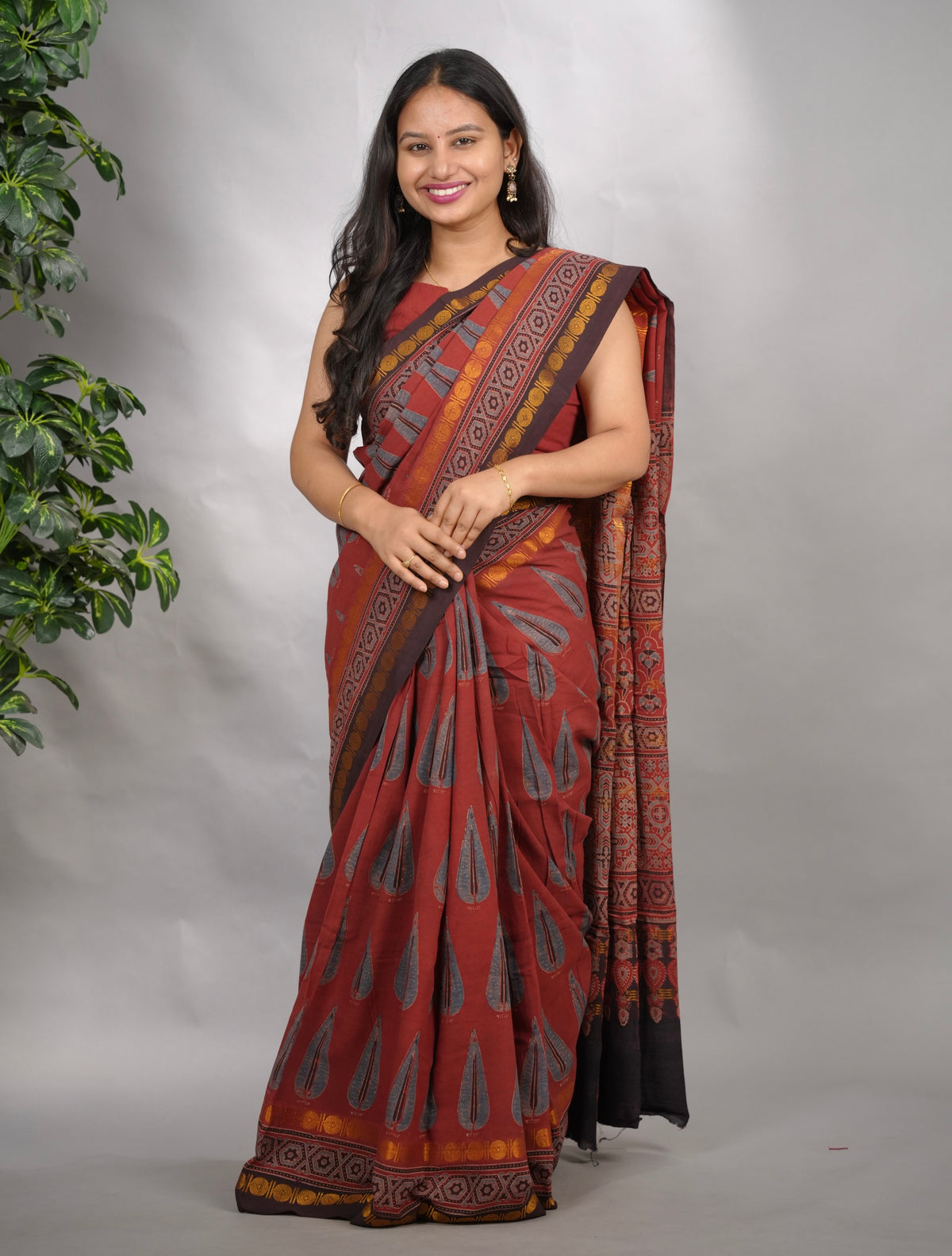 Maroon Ajrakh Hand Block Printed Sungudi Cotton Saree | Looms & Tassels
