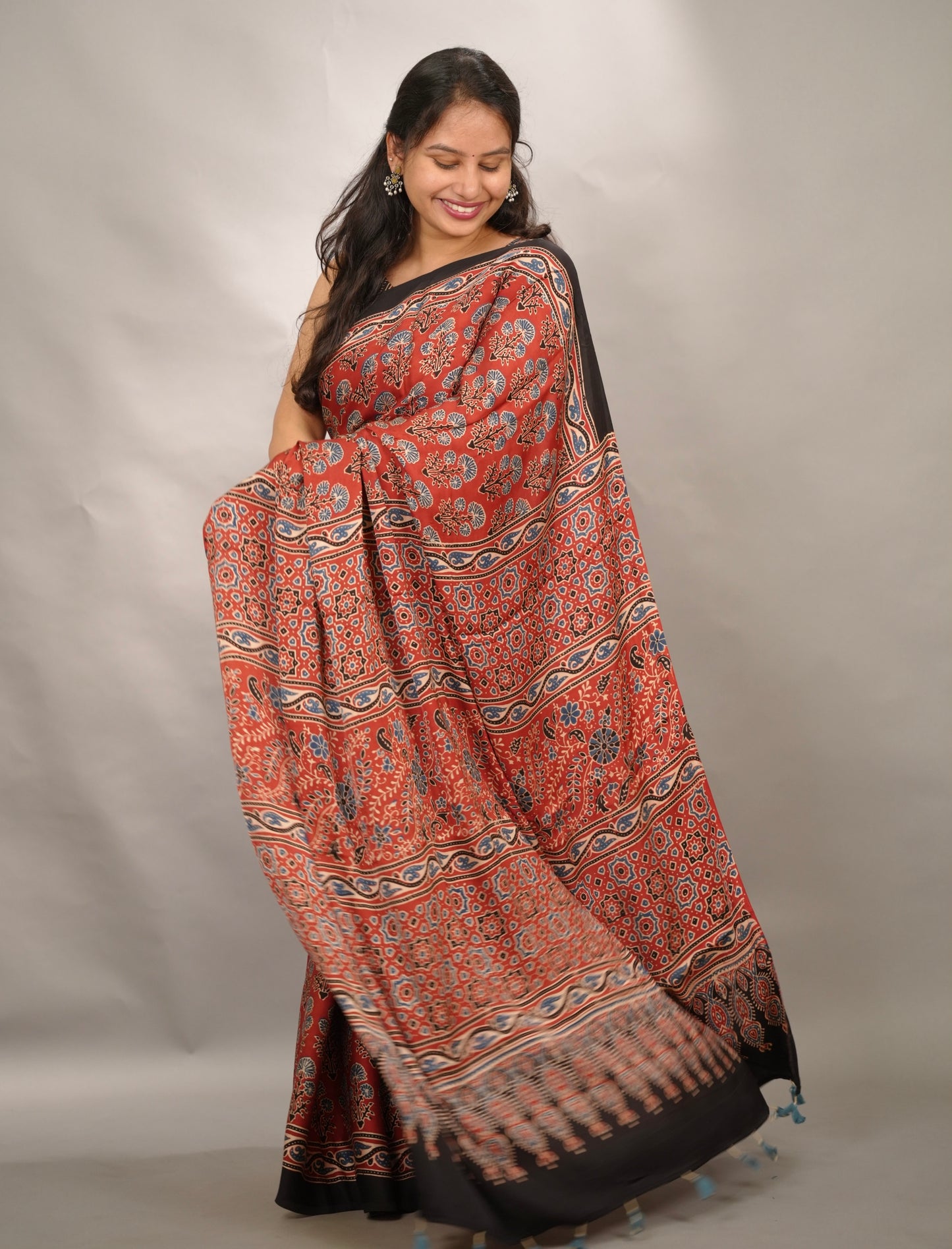 Maroon Kutchi Butta Authentic Ajrakh Handblock Printed Modal Silk Saree | Looms & Tassels