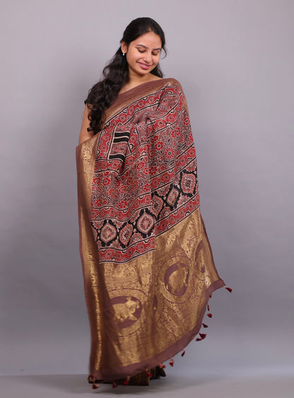 Brown Flower Butta Authentic Ajrakh Hand Block printed  Dola Silk Saree | Looms & Tassels