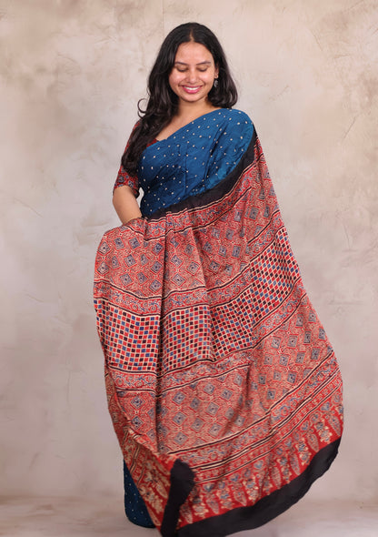 Cyan Blue Hand Knotted Bandhej Modal Silk Saree with Ajrakh Pallu | Looms & Tassels