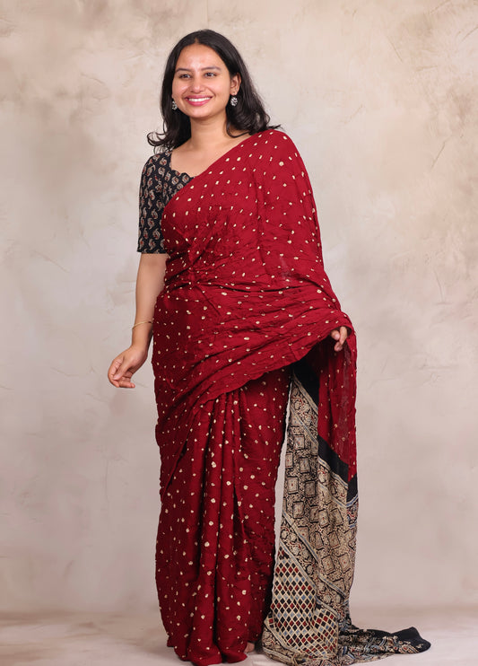Maroon Hand Knotted Bandhej Modal Silk Saree with Ajrakh Pallu | Looms & Tassels