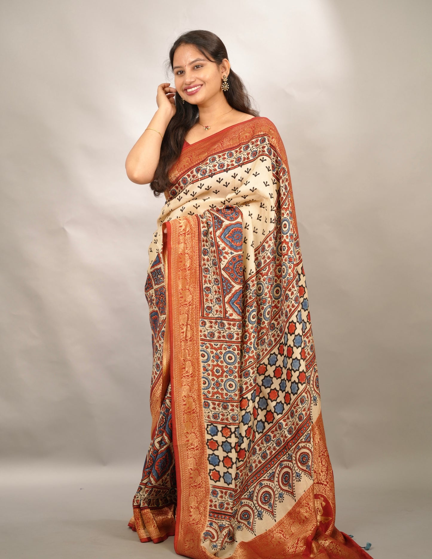 Cream Ajrakh Handblock printed Dola Silk Saree | Looms & Tassels