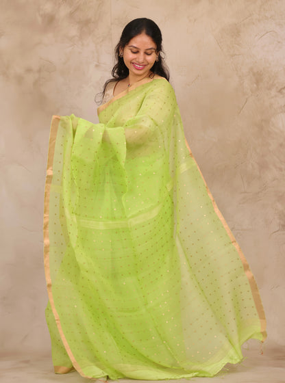 Pista Green Handwoven Muslin Silk Saree With Sequence Work | Looms & Tassels