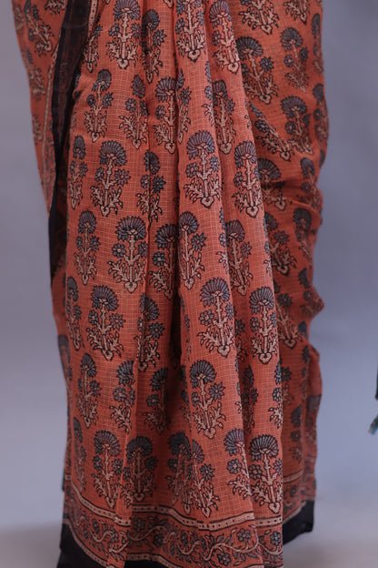 Rust Orange Ajrakh Hand Block Printed Kota Doria Saree | Looms & Tassels