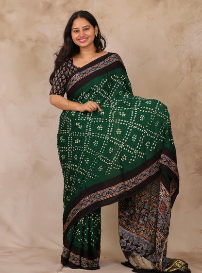 Bottle Green Hand Knotted Bandhej Arakh Modal Silk Saree with Lagdi Pallu | Looms & Tassels