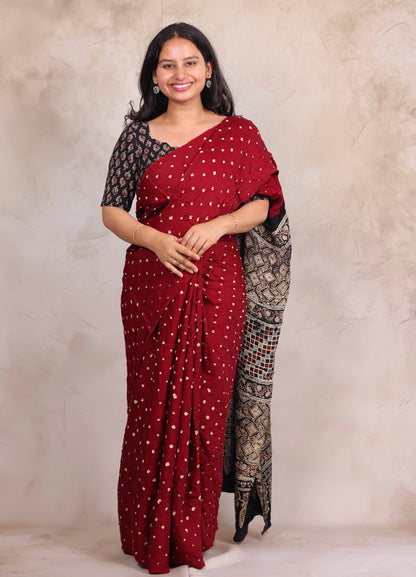 Maroon Hand Knotted Bandhej Modal Silk Saree with Ajrakh Pallu | Looms & Tassels