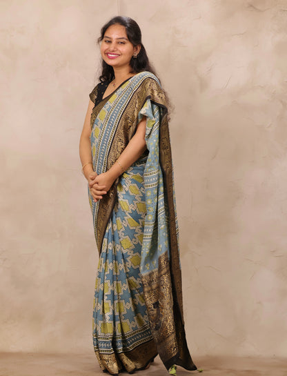 Sky Blue Ajrakh Handblock printed Dola Silk Saree | Looms & Tassels