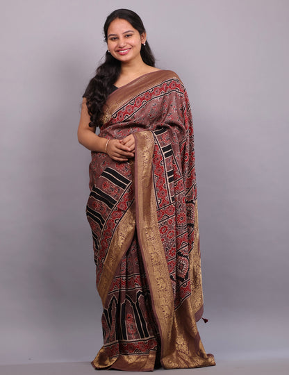 Brown Flower Butta Authentic Ajrakh Hand Block printed  Dola Silk Saree | Looms & Tassels