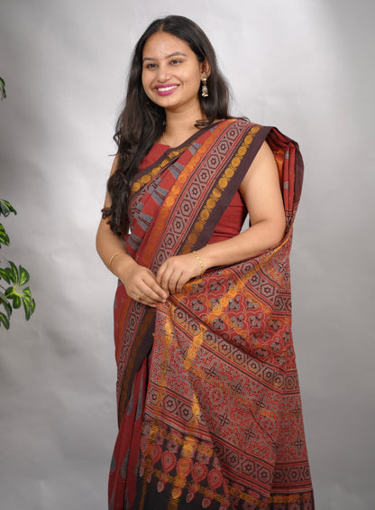 Maroon Ajrakh Hand Block Printed Sungudi Cotton Saree | Looms & Tassels