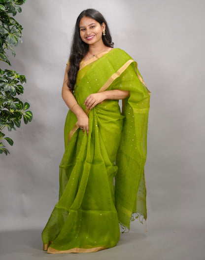 Parrot Green Handwoven Muslin Silk Saree With Sequence Work | Looms & Tassels