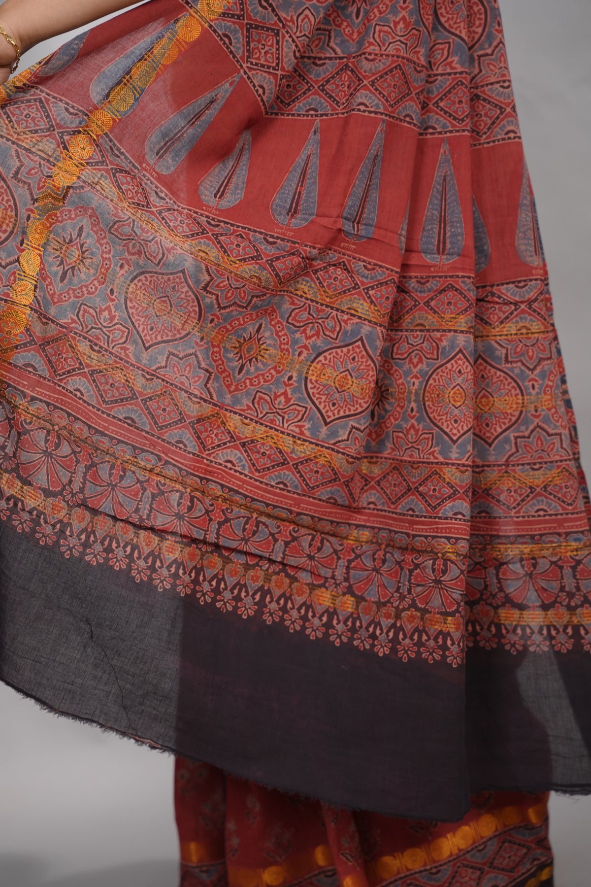Maroon Ajrakh Hand Block Printed Sungudi Cotton Saree | Looms & Tassels