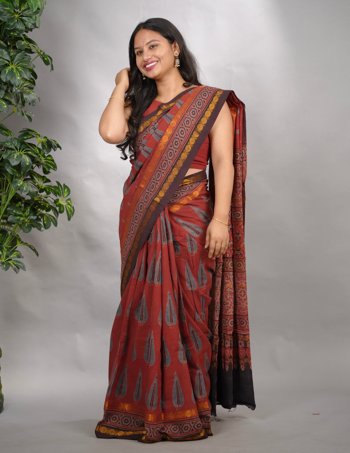 Maroon Ajrakh Hand Block Printed Sungudi Cotton Saree | Looms & Tassels