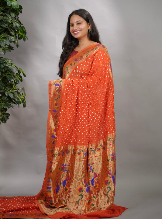 Orange Handcrafted Bandhani Paithani Dola Silk Saree | Looms & Tassels