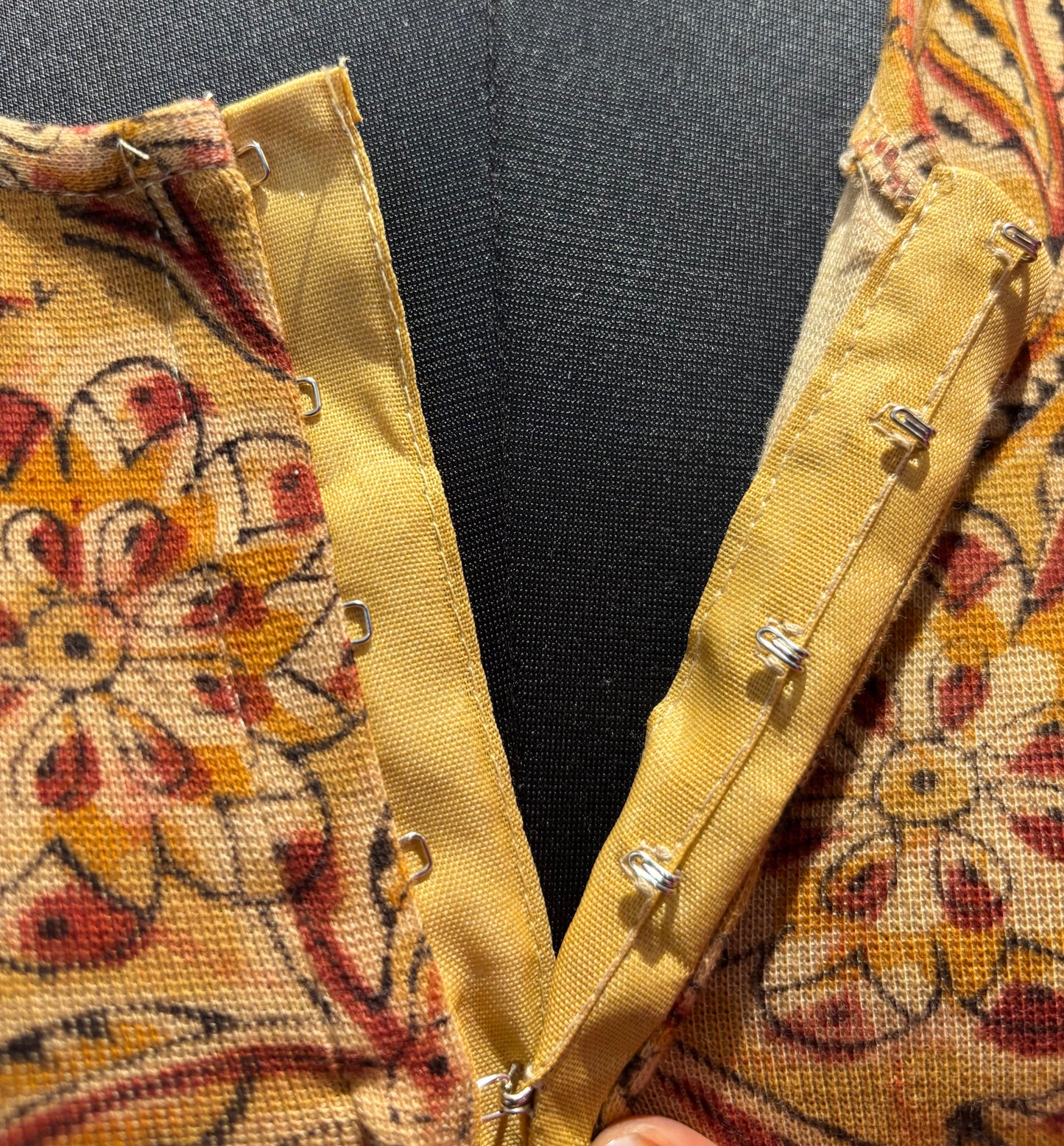 Mustard Round neck Stretchable Hand block printed kalamkari blouse with front hooks
