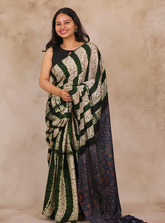 Bottle Green Needle Shibori and Ajrakh Handblock Printed Modal Silk Saree | Looms & Tassels