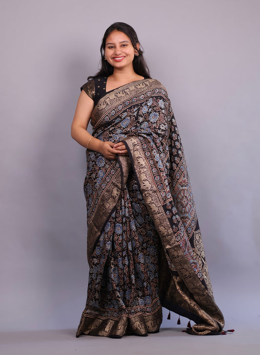 Black Flower Butta Ajrakh Handblock Printed Dola Silk Saree | Looms & Tassels
