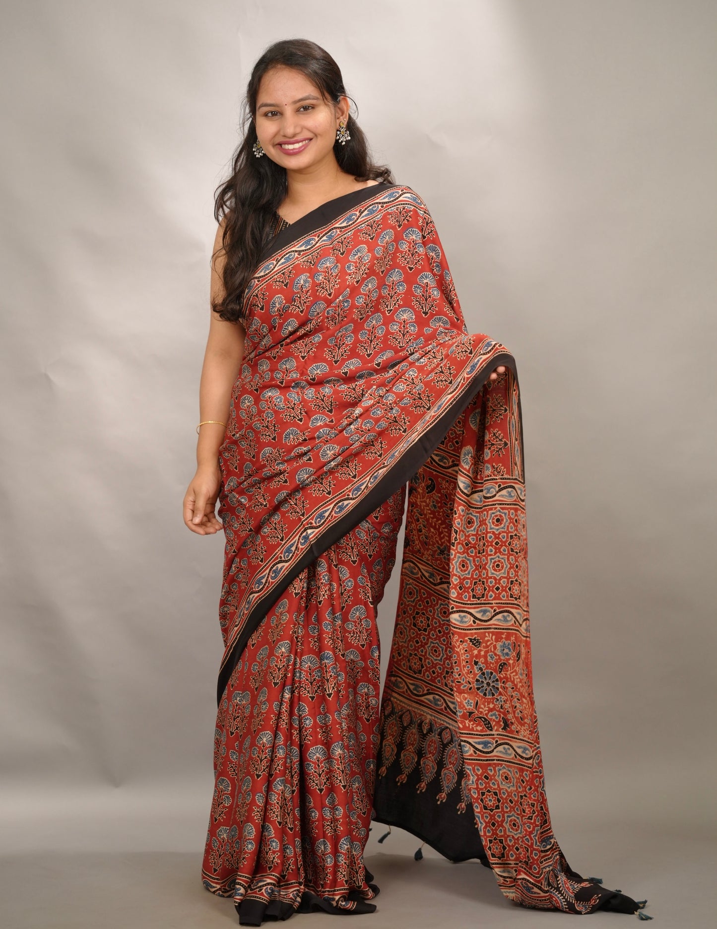 Maroon Kutchi Butta Authentic Ajrakh Handblock Printed Modal Silk Saree | Looms & Tassels