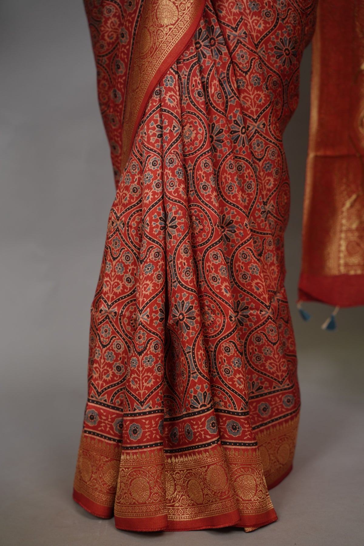 Maroon Ajrakh Handblock printed Dola Silk Saree| Looms & Tassels