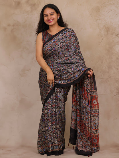 Black Handcrafted Ajrakh Modal Silk Saree with Authentic Banjara Mirror Work | Looms & Tassels