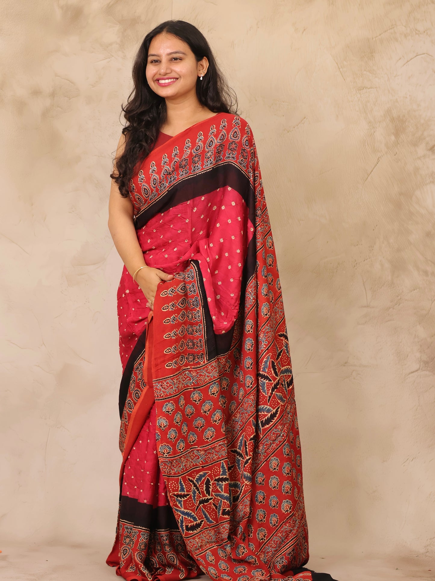 Pink Hand Knotted Ajrakh Bandhej Modal Silk Saree | Looms & Tassels