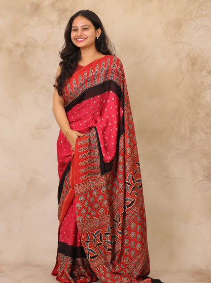 Pink Hand Knotted Ajrakh Bandhej Modal Silk Saree | Looms & Tassels