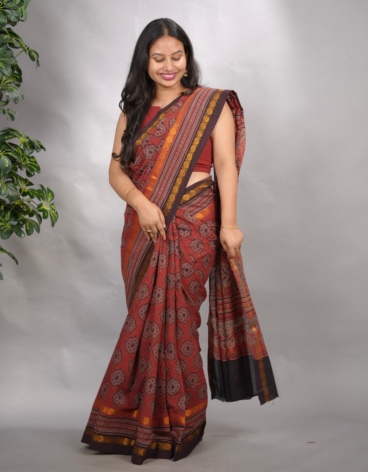 Maroon Ajrakh Hand Block Printed Sungudi Cotton Saree | Looms & Tassels