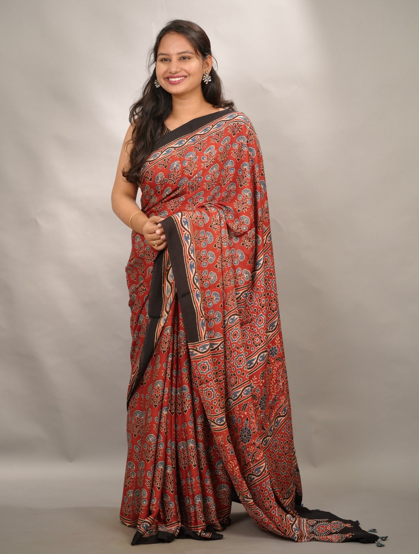 Maroon Kutchi Butta Authentic Ajrakh Handblock Printed Modal Silk Saree | Looms & Tassels