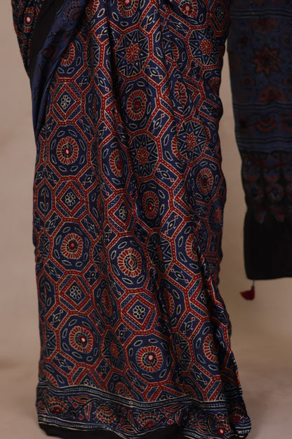 Indigo Handcrafted Ajrakh Modal Silk Saree with Authentic Banjara Mirror Work | Looms & Tassels