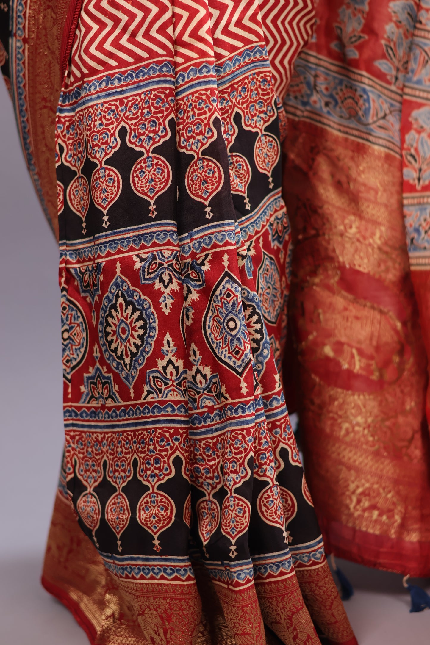 Red Ajrakh Handblock printed Dola Silk Saree | Looms & Tassels