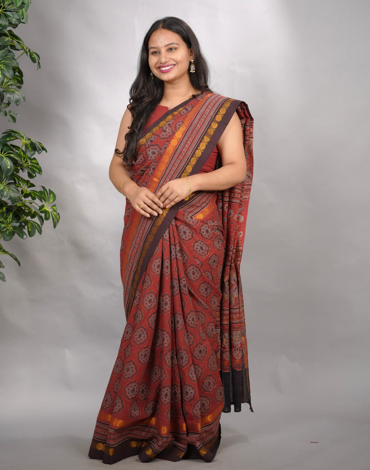 Maroon Ajrakh Hand Block Printed Sungudi Cotton Saree | Looms & Tassels