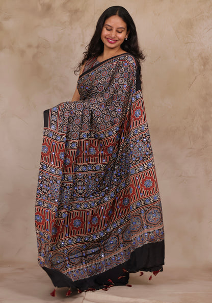Black Handcrafted Ajrakh Modal Silk Saree with Authentic Banjara Mirror Work | Looms & Tassels