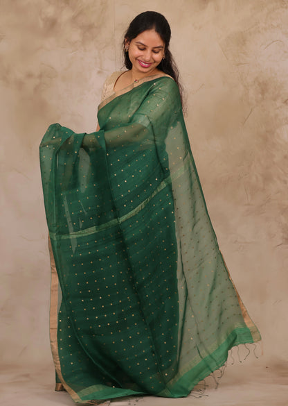 Green Handwoven Muslin Silk Saree With Sequence Work | Looms & Tassels