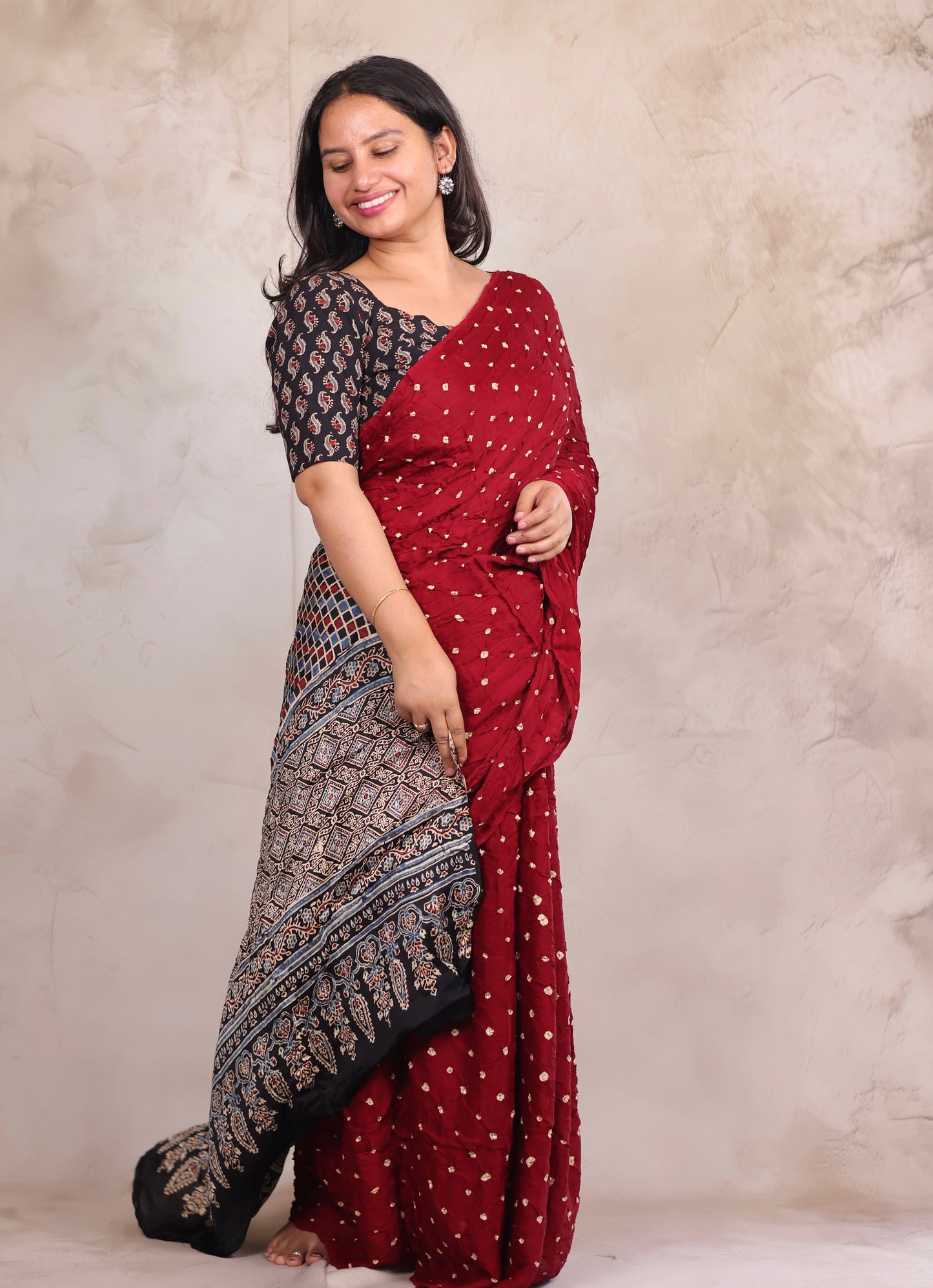 Maroon Hand Knotted Bandhej Modal Silk Saree with Ajrakh Pallu | Looms & Tassels
