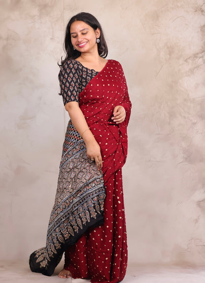Maroon Hand Knotted Bandhej Modal Silk Saree with Ajrakh Pallu | Looms & Tassels