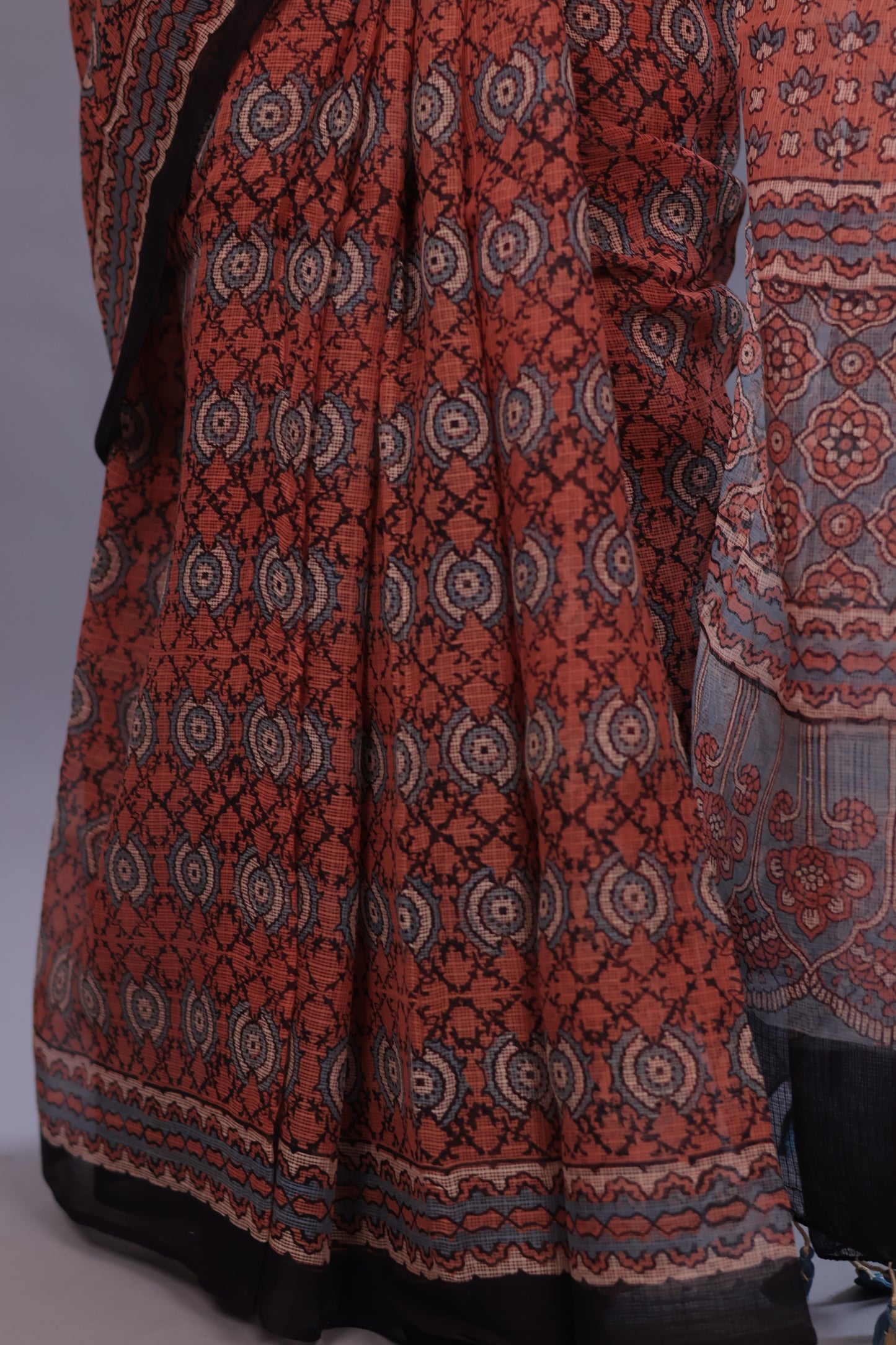 Rust Orange Ajrakh Hand Block Printed Kota Doria Saree | Looms & Tassels