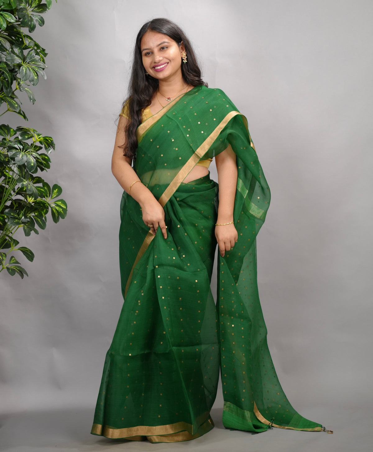 Bottle Green Handwoven Muslin Silk Saree With Sequence Work | Looms & Tassels