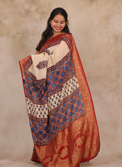 Cream Dotted Floral Ajrakh Handblock printed Dola Silk Saree | Looms & Tassels