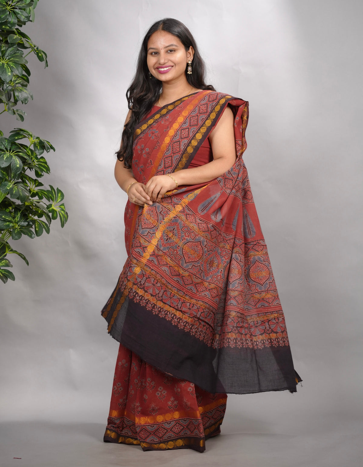 Maroon Ajrakh Hand Block Printed Sungudi Cotton Saree | Looms & Tassels