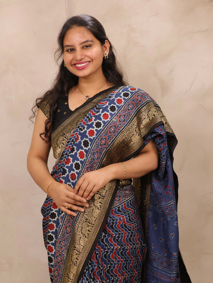 Indigo Ajrakh Handblock printed Dola Silk Saree | Looms & Tassels