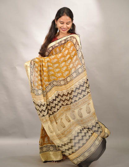 Mustard Chiffon Hand Block Printed Saree with Jari Border | Looms & Tassels
