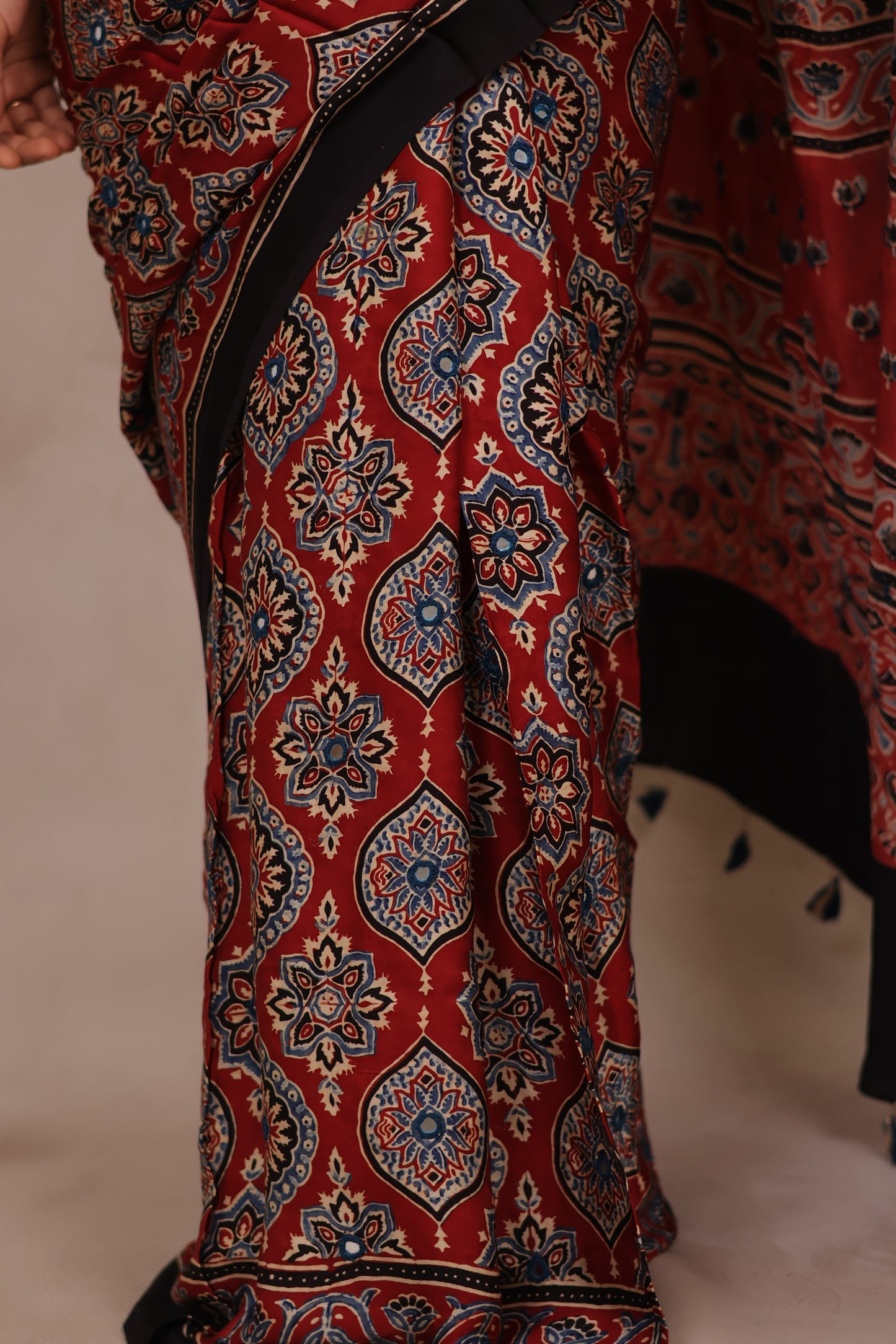 Red Handcrafted Ajrakh Modal Silk Saree with Authentic Banjara Mirror Work | Looms & Tassel