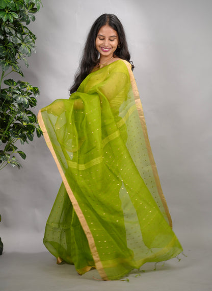 Parrot Green Handwoven Muslin Silk Saree With Sequence Work | Looms & Tassels