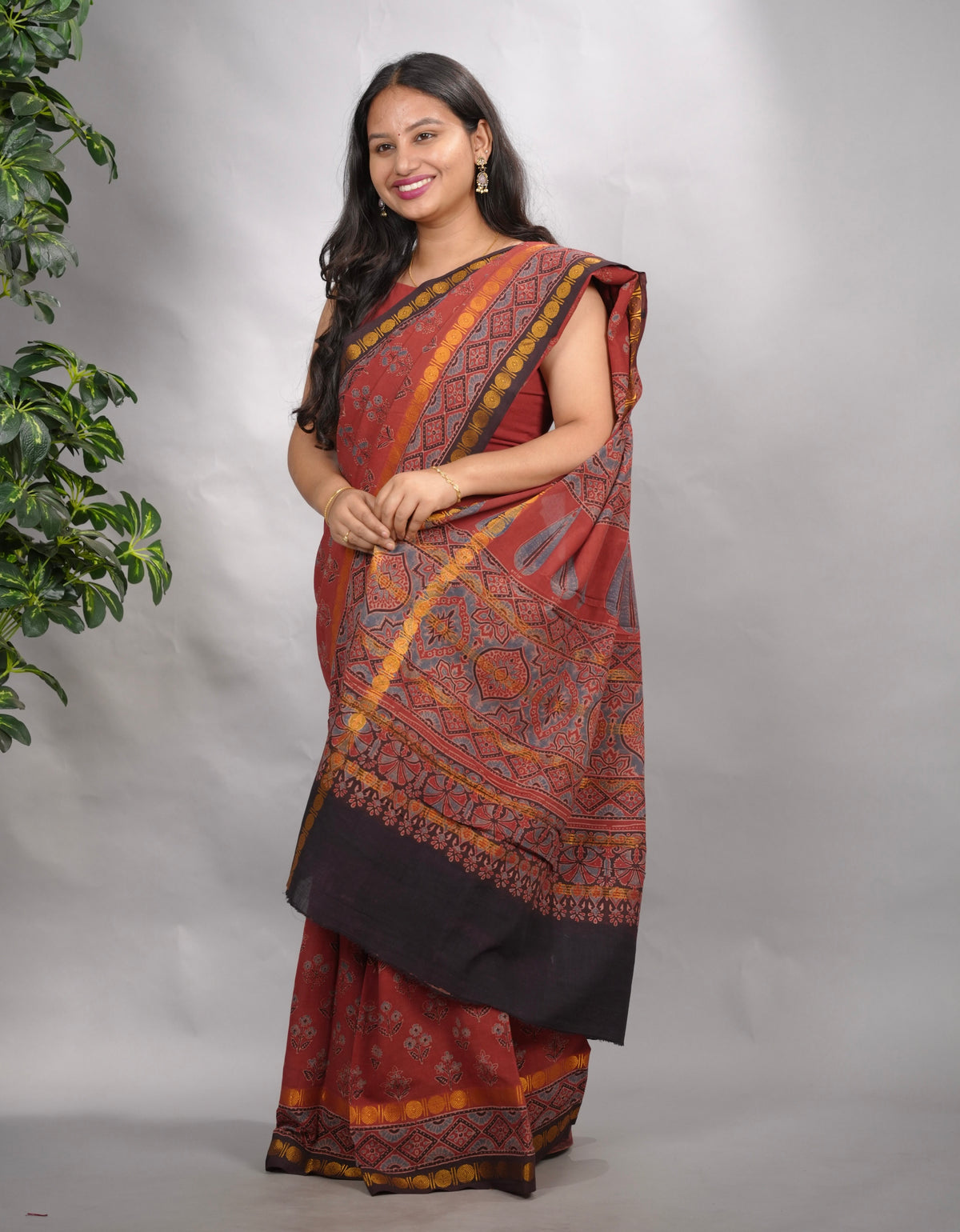 Maroon Ajrakh Hand Block Printed Sungudi Cotton Saree | Looms & Tassels