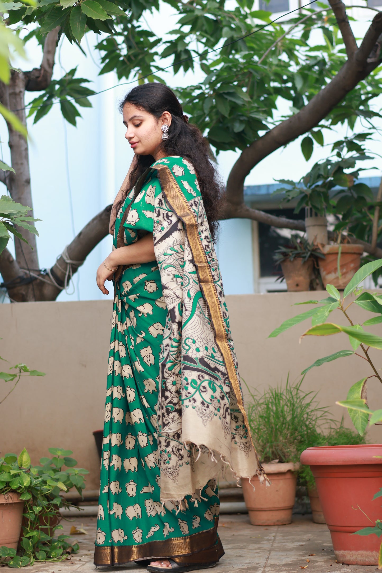 Green & Cream Elephant Kalamkari Silk Handcrafted Nizam Border Saree