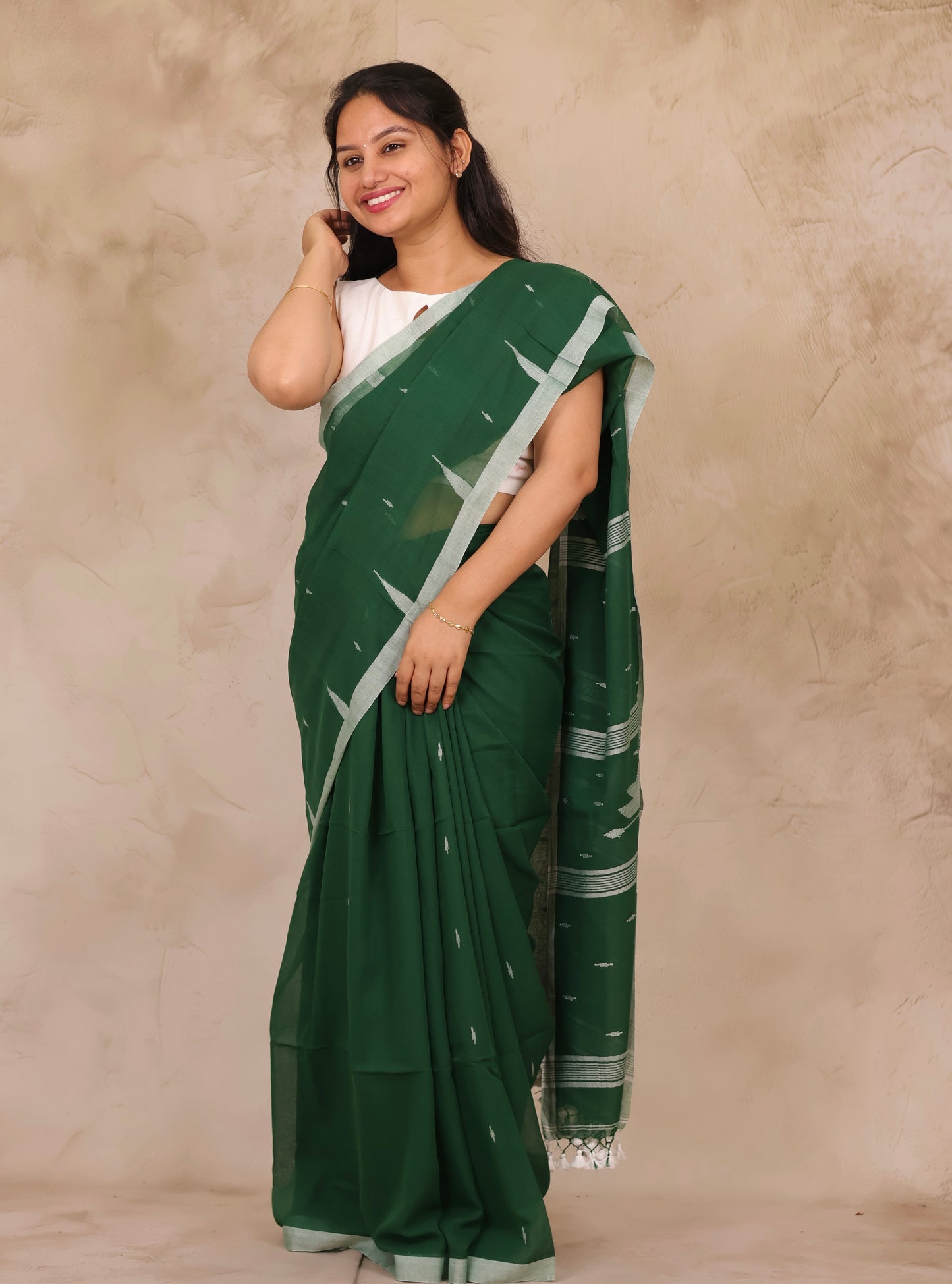 Bottle Green Malai Cotton Saree with Butta Weaving | Looms & Tassels