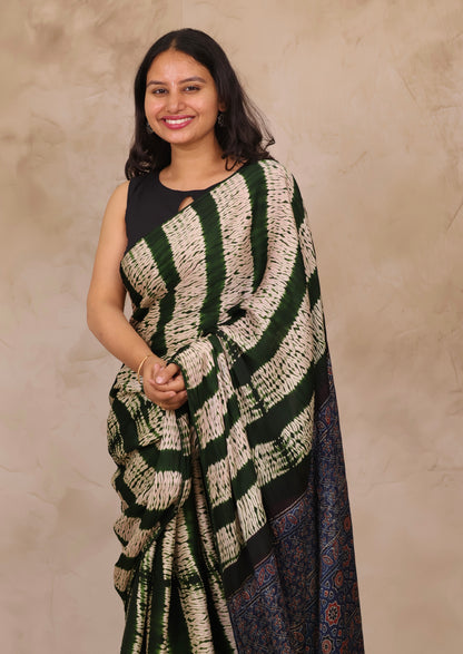 Bottle Green Needle Shibori and Ajrakh Handblock Printed Modal Silk Saree | Looms & Tassels