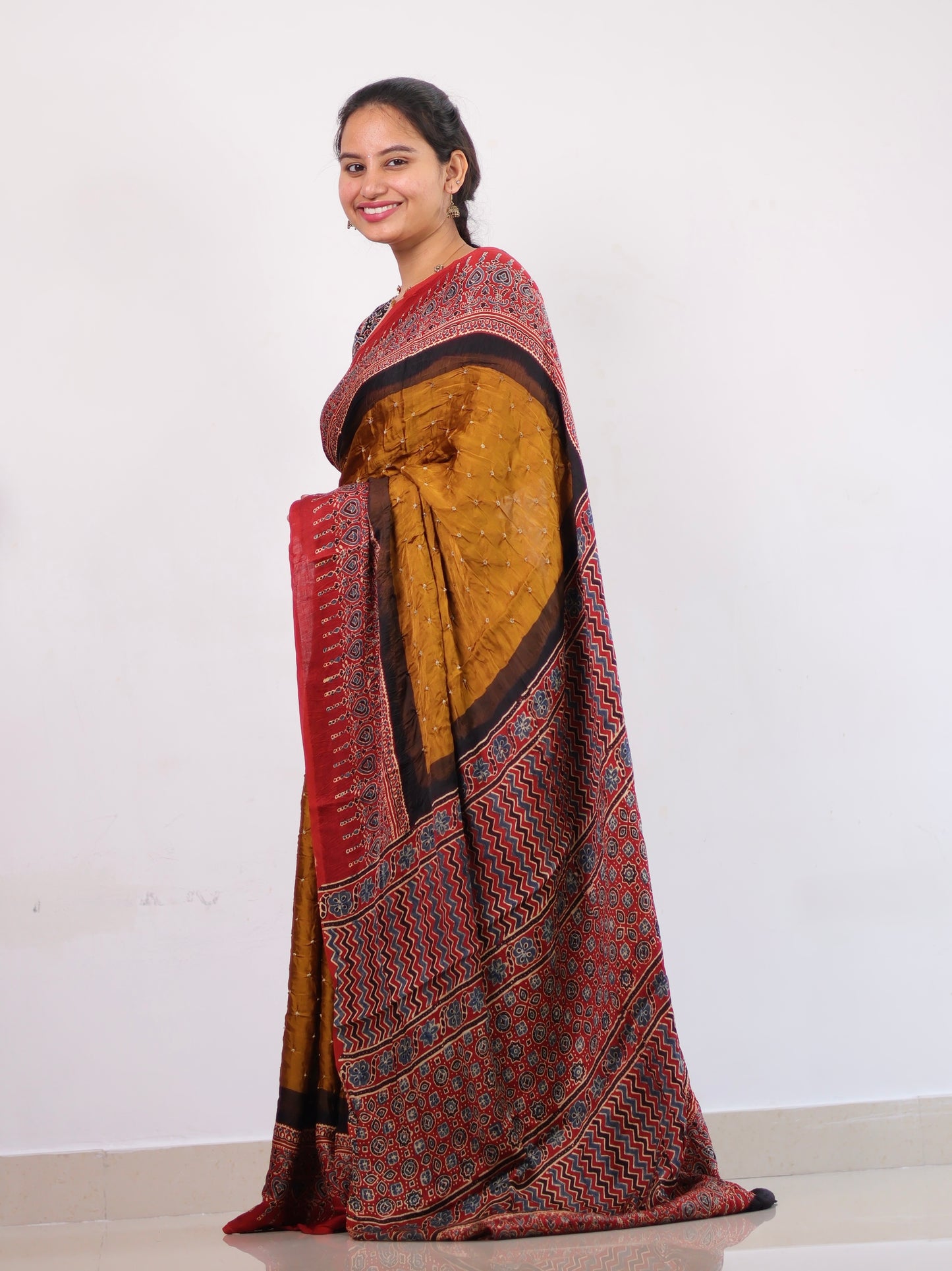 Mustard Ajrakh Bandhej Modal Silk Saree