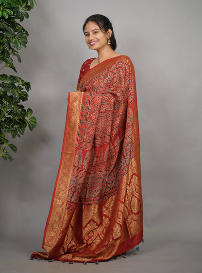 Maroon Ajrakh Handblock printed Dola Silk Saree| Looms & Tassels