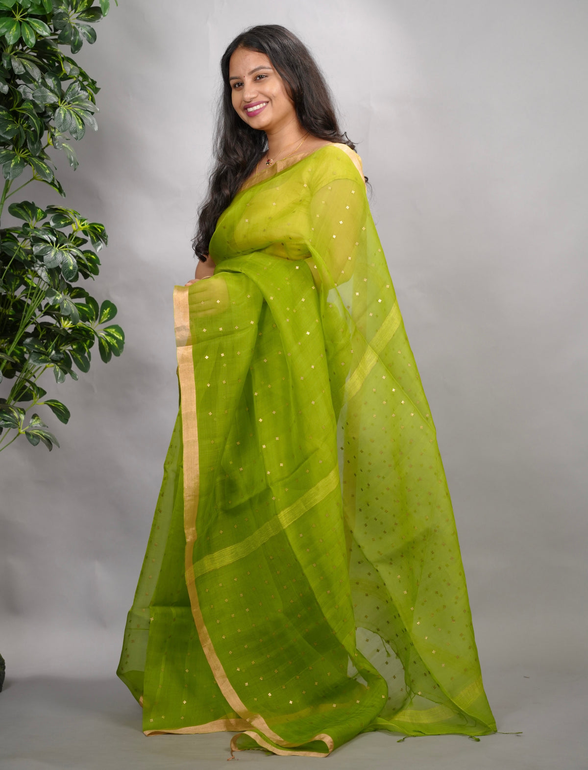 Parrot Green Handwoven Muslin Silk Saree With Sequence Work | Looms & Tassels