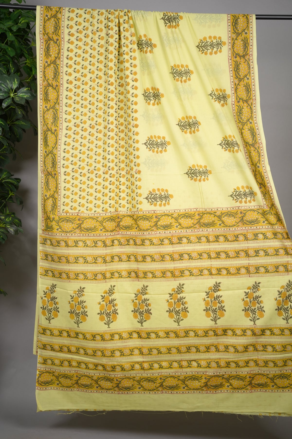 Pastel yellow Bagru Handblock printed MulMul cotton saree | Looms & Tassels